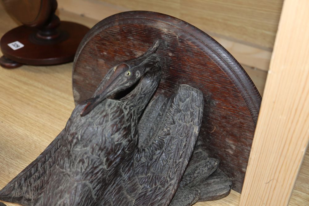 A 19th century Black Forest carved wood heron wall bracket, H.40cm